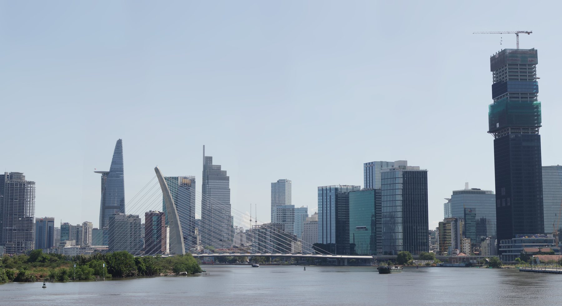 Ho Chi Minh City skyline and riverfront at dusk, used as the editorial hero for Vietnam city ranking